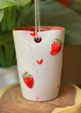 Piece of Sara Strawberry Straw Cup