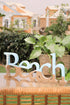 The Words Co Beach calligraphy