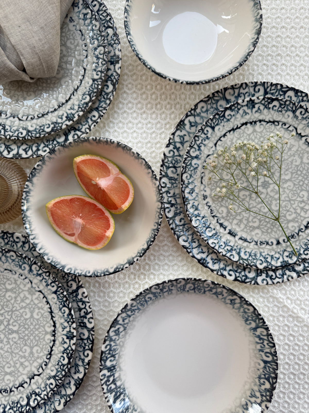A styled Tulu porcelain table setting