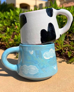 Piece of Sara Cow mug