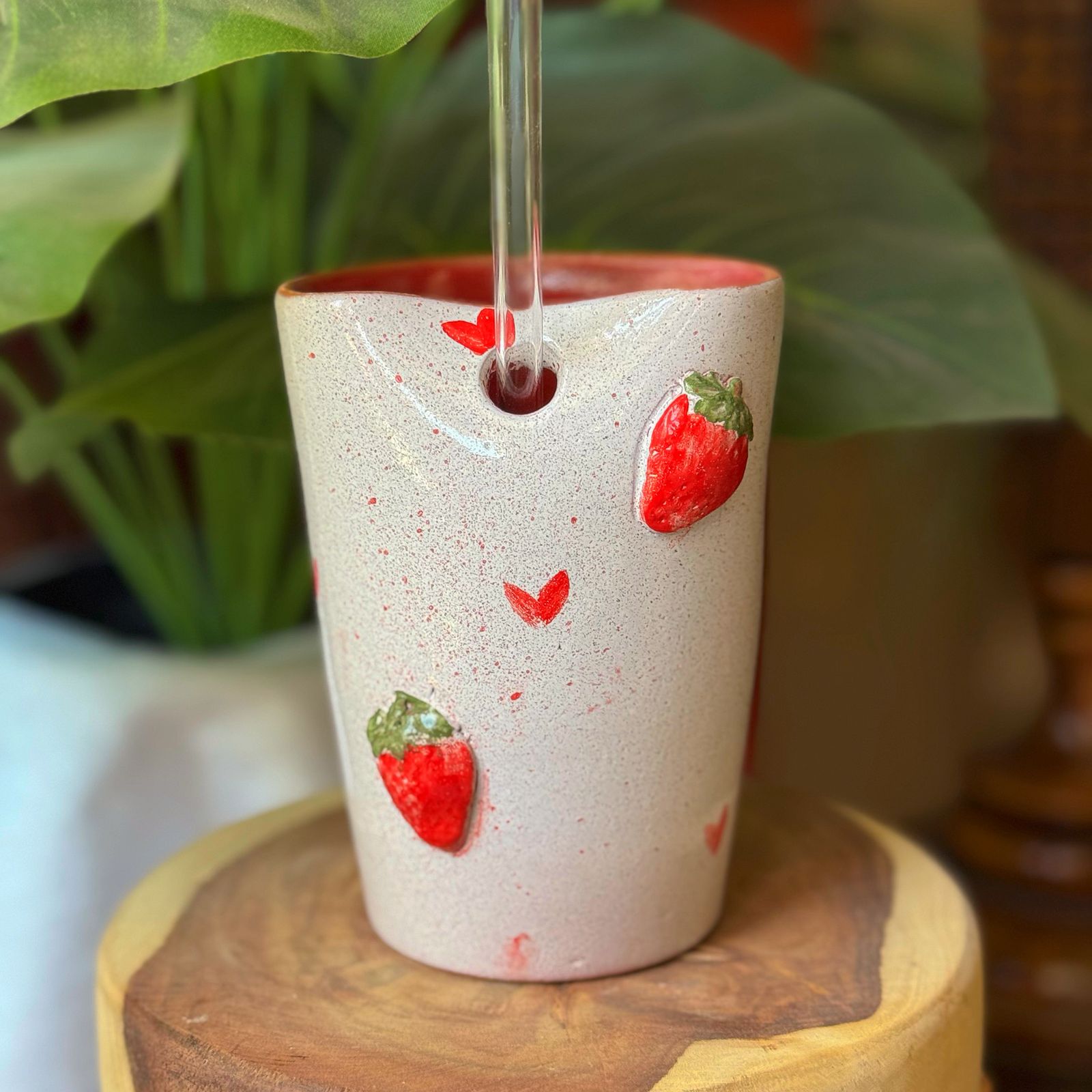Piece of Sara Strawberry Straw Cup