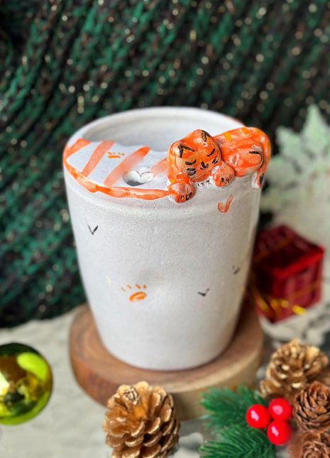 Piece of Sara Michmich Kitty Tumbler