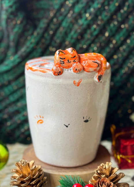 Piece of Sara Michmich Kitty Tumbler