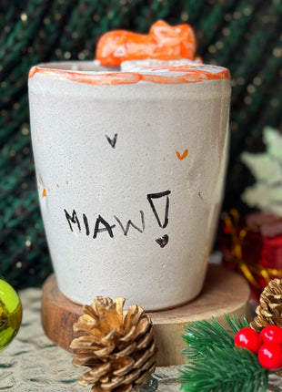 Piece of Sara Michmich Kitty Tumbler