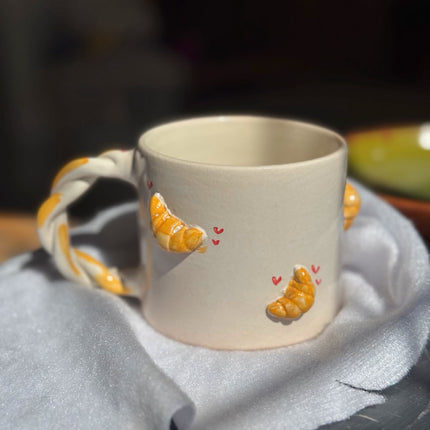 Piece of Sara Morning Croissant Mug