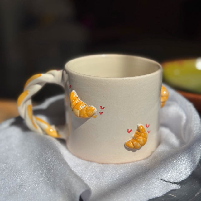 Piece of Sara Morning Croissant Mug
