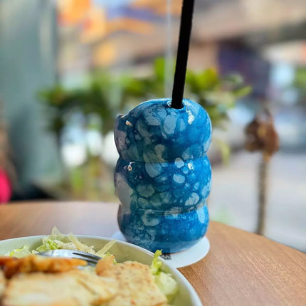 Piece of Sara Bubbles Blue Cup