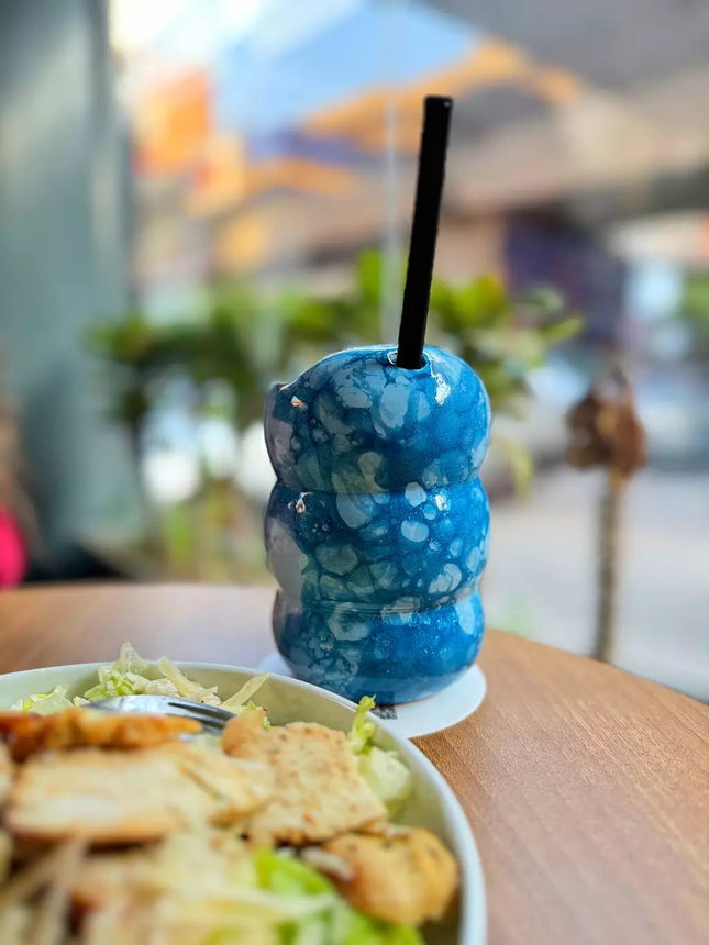 Piece of Sara Bubbles Blue Cup